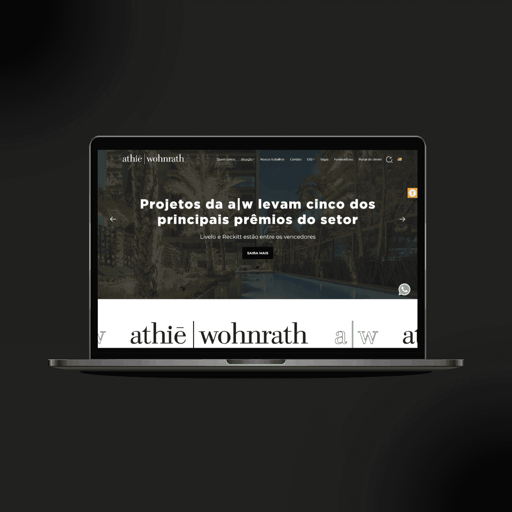 Athié Wohnrath website home page shown on a laptop